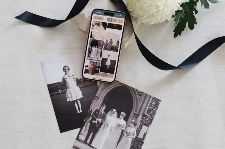Memorial photos and smartphone for digital tribute sharing.