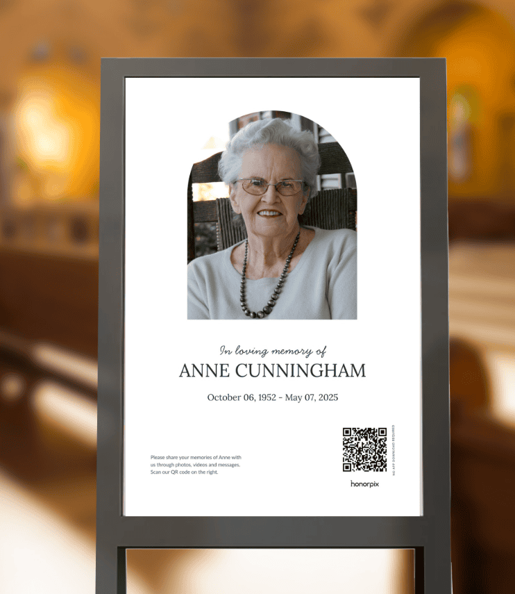 Memorial display for Anne Cunningham with QR code and photo.