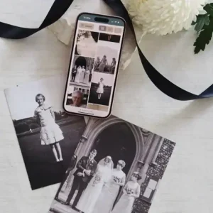 Memorial photos and smartphone for digital tribute sharing.